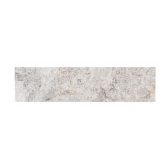 a white marble tile wall border