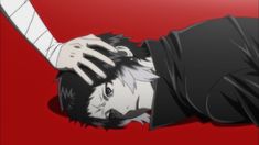 an anime character laying on the ground with his head down