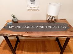 a wooden table with a sign that says diy live edge desk with metal legs