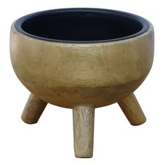 a small wooden bowl sitting on top of a table