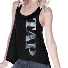 a woman wearing a black tank top with the word david printed on it