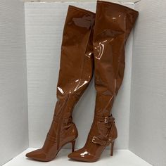 Excellent, Like New Condition. Only Sign Of Wear Is Scuff On Left Heel (See Last Picture) Measurements Are In The Pictures. Fitted Thigh High Patent Leather Boots, Glamorous Leather Knee-high Boots, Elegant Brown Thigh High Heeled Boots, Patent Leather Knee-high Boots For Night Out In Fall, Chic Brown Knee-high Evening Boots, Brown Knee-high Heeled Boots For Night Out, Chic Patent Leather Boots With Buckle Closure, Fitted Heeled Boots With Buckle Closure And Pointed Toe, Glamorous Fitted Leather Knee-high Boots