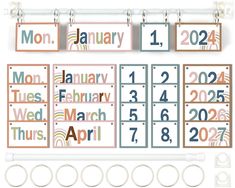 a calendar with months and numbers hanging on the wall next to keyrings for each month