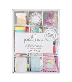 the box contains many different types of paper and crafting supplies, including washcloths