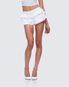 Nothing screams demure quite like a white bloomer skort 😌 With flirty ruffles and a cheeky cut, this piece made from a blend of cotton and lace fabric has built in shorts, making it the best of both worlds when it comes to effortless style 🤍 Ruffle Bloomers, Black Off Shoulder, Best Of Both Worlds, Graphic Top, White Jersey, Pocket Pants, White Mini Dress, Lace Fabric, Effortless Style