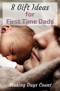 a man holding a baby in his arms with the words 8 gift ideas for first time dad