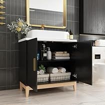 a bathroom with a sink, mirror and black cabinet in the middle of the room