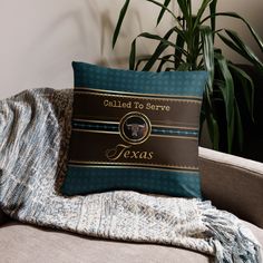 a couch with a pillow on it that says called to serve in the texas language