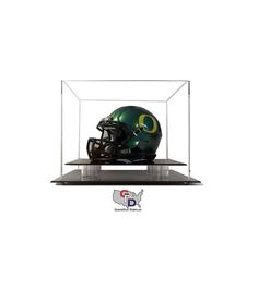 a green bay packers helmet in a glass display case on top of a white background