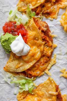 tortilla shells with salsa, lettuce and sour cream