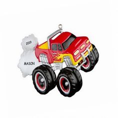 a red and yellow monster truck ornament on a white background