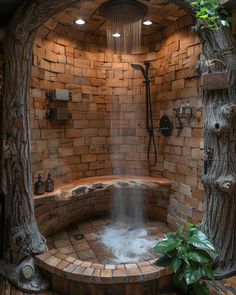 an outdoor shower is shown in the middle of a room with brick walls and flooring