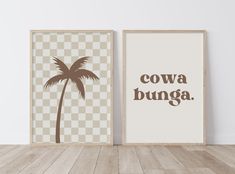 two framed posters with the words, cowa bunga and a palm tree on them