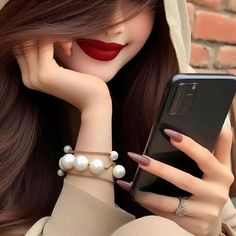 a close up of a woman holding a cell phone with her hand near her face