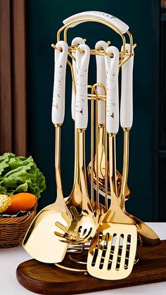 a golden utensil holder with forks and spoons