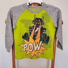 Gap Robot Pow Baseball Tee Green Long Sleeve Grey Sleeves Robot Pow Graphic Tee Gap Graphic Tee With Character Print, Gap Cotton Tops With Character Print, Gap Cotton Top With Cartoon Print, Gap Short Sleeve T-shirt With Character Print, Long Sleeve T-shirt With Character Print For Playtime, Fun Long Sleeve T-shirt For Playtime, Green Long Sleeve Cartoon Print Top, Green Long Sleeve Top With Cartoon Print, Casual Cartoon Print Tops By Gap