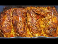 some meat and rice in a pan on a table