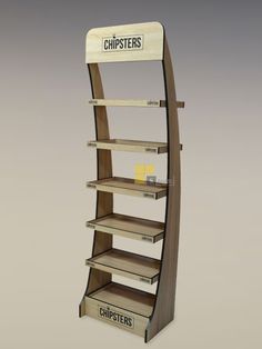 a display case for chipster's in the shape of a curved book shelf