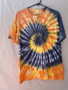 Spooky Spiral, black, deep orange & golden yellow Retro Multicolor T-shirt For Fall, Retro Orange T-shirt For Fall, Spring Black Hand-dyed Tops, Black Hand Dyed Tops For Spring, Riverside Cottage, Tie Dye Socks, Disney Family Vacation, Deep Orange, Golden Yellow