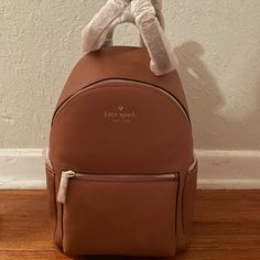 Brand New Kate Spade Backpack. Never Used, Original Wrapping Still Intact. Luxury Kate Spade Backpack With Zipper Closure, Elegant Kate Spade Standard Backpack, Kate Spade Brown Bag With Zipper Closure, Brown Kate Spade Bag With Zipper Closure, Kate Spade Leather Backpack With Detachable Strap For On-the-go, Kate Spade Leather On-the-go Backpack, Kate Spade On-the-go Backpack With Detachable Strap, Kate Spade Backpack, Bags Kate Spade