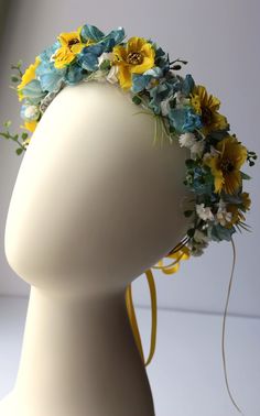 Holiday blue yellow Floral Hair Piece, Blue Yellow Flower Hair piece Crown, Flower hair faux wreath. A beautiful blue yellow accent for your hair will make your look unique. I made it with artificial flowers and greenery and wire. Ribbon at the back allows you to make the size you need. This flower crown can be used for Holidays. Weddings, for a photo shoots. Wreath can be used for hair and for a hat. Boutonniere included. You may also like this: https://www.etsy.com/listing/1466728137/blue-flower-crown-wedding-hair-accessory?click_key=e3046bd75af07434f695967140a2ca755c050178%3A1466728137&click_sum=bf02f29d&ref=shop_home_active_8&frs=1 Thank you for visiting my shop. Enjoy. Iuliia Hydrangea Flower Crown, Yellow Flower Crown, Faux Wreath, Floral Hair Piece, Blue Flower Crown, Flower Hair Piece, Bride Head, Floral Hair Pieces, Flower Hair Pieces