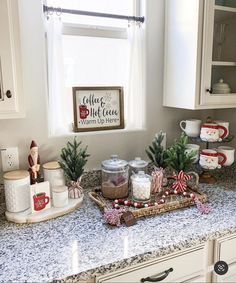 the kitchen counter is decorated for christmas