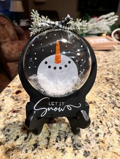 a snow globe sitting on top of a counter