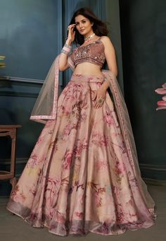 Beige readymade organza circular lehenga choli 1232 Desc: Style : Circular Lehenga Choli Color : Beige Fabric : Organza Work : Embroidery Wash Care : Dry clean Sleeve Style : Sleeveless Long Sleeves : Done only in Custom Stitch Sleeves Lining : Done only in Custom Stitch Bust Size : 40 to 42 Inches Occasion : Wedding Diwali Eid Mehendi Sangeet Engagement Reception Ceremonial. With Express Free Shipping Buy Indian Party wedding wear Bridal Lehenga Choli Beige readymade organza circular lehenga ch Orang India, Simple Lehenga, Organza Lehenga, Floral Lehenga, Indian Outfits Lehenga, Lehenga Designs Simple, Gaun Fashion, Choli Designs, Lehenga Choli Online