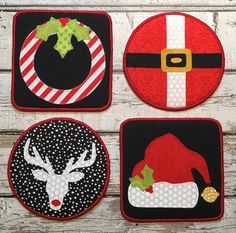 four christmas coasters with santa's hat and reindeer