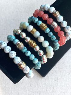 "This listing is great for your Mom, Grandma, Aunt, or special human in your life! Each bracelet has a gorgeous mixed metal spacer in different themes: Forever, Family, Love, Faith, and Believe Listing E is made of silver metal round beads and not gemstones. OSFM small to medium adult wrist. My wrist measures 6.5\" around and these bracelets fit well and move." Stack Bracelets, Vintage Baby Clothes, Bridesmaid Gift Boxes, Faith Love, Travel Jewelry Box, Mixed Metal Jewelry, Gift For Woman, Personalized Gifts For Her, Love Family