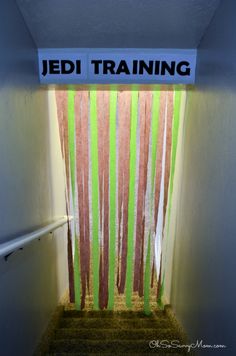 the door is open and there is a sign above it that says jedi training