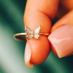 Look oh-so-fly in our ultra femme and fashionable butterfly rings. A delicate butterfly poised for flight in shimmering silver or romantic rose gold, a whimsical edition to any ring stack. Minimalist Butterfly Ring As A Gift, Dainty Butterfly Charm Rings, Minimalist Butterfly Ring As Gift, Adjustable White Butterfly Ring, Minimalist Butterfly Ring For Gift, Dainty Butterfly Rings With Charm, Elegant Summer Jewelry With Butterfly Charm, Dainty Rings With Butterfly Charm, Elegant Adjustable Rose Gold Butterfly Ring