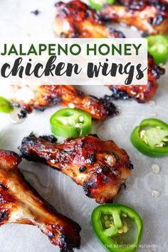 grilled chicken wings with jalapeno peppers on the side and text overlay that reads, jalapeno honey chicken wings