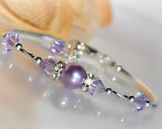 Silver and Blue Crystal Bangle Bracelet/pearls/bridal - Etsy Elegant Purple Bracelets For Wedding, Elegant Purple Wedding Bracelets, Purple Beaded Bracelets For Wedding, Elegant Purple Crystal Bracelet, Sterling Silver Beaded Bracelets For Wedding, Trendy Jewelry Ideas, Clear Crystal Bracelet, Bracelet Pearls, Beaded Jewelry Bracelets