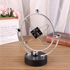 Ball Rotating Perpetual Motion Pendulum Interactive Ornament - OnShelf Pendulum Balls, Newton's Cradle, Science Physics, Balance Ball, Perpetual Motion, Craft Home, Isaac Newton, Kinetic Sculpture, Physical Science