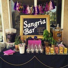 there is a sign that says sanggria bar on the table