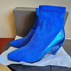 Make A Statement In These Stunning Bright Blue Suede & Metallic Leather Booties. Brand New In Box Never Tried On. Only Taken Out Of Box For Photos. Eu Size 40 & 41 Us Size 9.5 & 10.5. Bought For A Client But We Went With Another Style Blue High Heel Summer Boots, Blue Ankle-high Summer Boots, Blue Ankle-high Boots For Spring, Blue Closed Toe Boots For Spring, Fitted Blue Closed Toe Boots, Blue Round Toe Boots For Summer, Blue Closed Toe Summer Boots, Blue Summer Boots With Round Toe, Blue Pointed Toe Boots For Spring