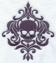 a skull and swirls on a white towel