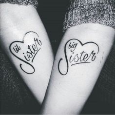 two people with matching tattoos that say we are sister and big sister on their arms