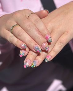 Bursting with color, this floral design features a variety of brightly colored flowers against a soft pink base. The detailed petals and leaves create a lively, garden-inspired look. The smooth, rounded oval shape and glossy finish make this manicure a beautiful choice for outdoor summer events.@bees.knees.nails Nails Bees, Lemon Nails