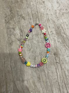 This listing is for a one of a kind fun colorful necklace with your choice of name or word. You will receive a one of a kind necklace in rainbow colors with smileys, hearts, stars, gummy bears, crowns, and other fun beads. Perfect for kids or for adults to wear! Necklace has a clasp This items is personalized and is final sale. Please familiarize yourself with my shop policies.  If shopping for a toddler or kid- 13-15 inches would be recommended for length. For adults, 14-18 inches is recommende Colorful Necklace, Colourful Necklace, Necklace Personalized, Gummy Bears, Personalized Necklace, Name Necklace, Shop Policies, Rainbow Colors, Final Sale