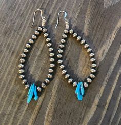 New Navajo hand made sterling silver desert pearls and turquoise earrings.  3" high 1" wide Price includes USPS priority shipping  *while supplies last I will include a silver polishing cloth with your order* *to slow down natural silver tarnish keep in an airtight environment* *Ships in a padded mailer made in the USA from 100% recycled content. Recycle with other paper products or reuse by covering the shipping label with a new one.* Southwestern Style Silver Beaded Dangle Jewelry, Silver Southwestern Beaded Earrings, Southwestern Silver Dangle Beaded Earrings, Silver Southwestern Style Dangle Beaded Earrings, Southwestern Silver Beaded Earrings, Southwestern Adjustable Silver Beaded Earrings, Deer Antler Jewelry, Antler Jewelry, Turquoise Earrings