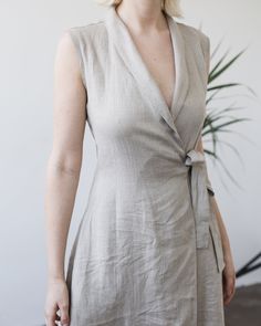 "A simply alluring and very feminine maxi dress in a color natural gray. Made from Lithuanian washed linen fabric that gives you a very nice appeal as well as a luxurious feel. FABRIC: 100% Softened Lithuanian Linen COLOR: Please choose the desired color from the side menu. STYLE: Sleeveless wrap dress with a belt to tie on the side. The fitted design also features a shawl collar and side pockets. SIZE CHART: 2 US/ 6 AU/ 34 EU: Bust 31.5\" (80 cm) , Waist 23\" (59 cm), Hips 35\" (88 cm) 4 US/ 8 Wrap Dress Sleeveless, Grey Wrap Dress, Dress With A Belt, Natural Linen Dress, Linen Wrap Dress, Sleeveless Linen Dress, Sleeveless Wrap Dress, Dress With Shawl, Linen Tee