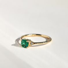 A lush emerald, set between Jennie Kwon�s signature milgrain-edged triangles. Classic, with modern touches: a 21st century ring. See "Details" for item specifics (carat weight, metal, etc) Luxury Trillion Cut Emerald Ring For Formal Occasions, Luxury Trillion-cut Emerald Ring, Luxury Trillion Cut Emerald Jewelry, Luxury Trillion Cut Diamond Emerald Ring, Luxury Trillion Cut Emerald Diamond Ring, Green Trillion Cut Diamond Ring, Formal Trillion-cut Emerald Jewelry, Formal Trillion Cut Emerald Ring, Emerald Jewelry With Trillion Brilliant Cut