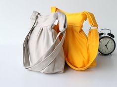 Pleated Bag in Canary Yellow  Small  adjustable by bayanhippo, $33.00 Pleated Bag, Canvas Messenger Bag, Canary Yellow, Waxed Canvas, One Bag, Strap Tops, Messenger Bags, Canvas Bag, Drawstring Backpack