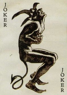 the joker playing card has an image of a demon on it's face and legs