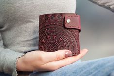 Small Wallet with Sun Pattern, Designer Wallets, Women Wallets, Leather Wallets, Handmade Leather Wallets Embossed Looking to upgrade your wallet game? Look no further! Introducing our all-new leather wallet that combines elegance and practicality in one stunning accessory. Here are the key features of our product: ✔️ Functions: High-quality genuine leather: Our wallet is crafted from the finest goat leather, showcasing its natural beauty and durability. Author's ornament: The wallet features a unique design pattern, adding a touch of individuality to your style. Functionality and durability: With multiple compartments and a secure closure, our wallet offers practicality and long-lasting performance. Compact size: Measuring 3.8 inches x 4.3 inches, it's designed to be slim and compact, eas Luxury Textured Leather Elegant Wallet, Luxury Elegant Leather Wallets, Luxury Women's Wallets With Leather Lining, Luxury Leather Elegant Wallets, Luxury Elegant Textured Leather Wallet, Luxury Elegant Embossed Wallets, Luxury Handmade Wallets For Daily Use, Luxury Embossed Elegant Wallets, Luxury Artisan Wallets For Everyday Use