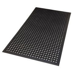 a black mat with white dots on it