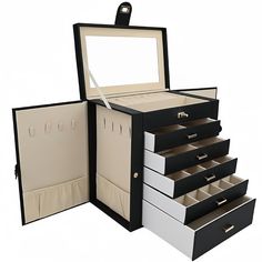 an open black and white jewelry box with five drawers