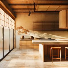 a kitchen with wooden cabinets and counter tops